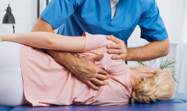 Someone getting a back massage for Muscular Strains and Tears