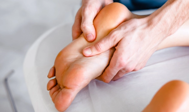 Someone getting a foot massage for Plantar Fascitis