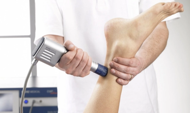 Someone receiving Shockwave Therapy